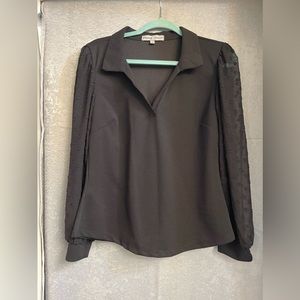 Women’s formal black top with mesh sleeves